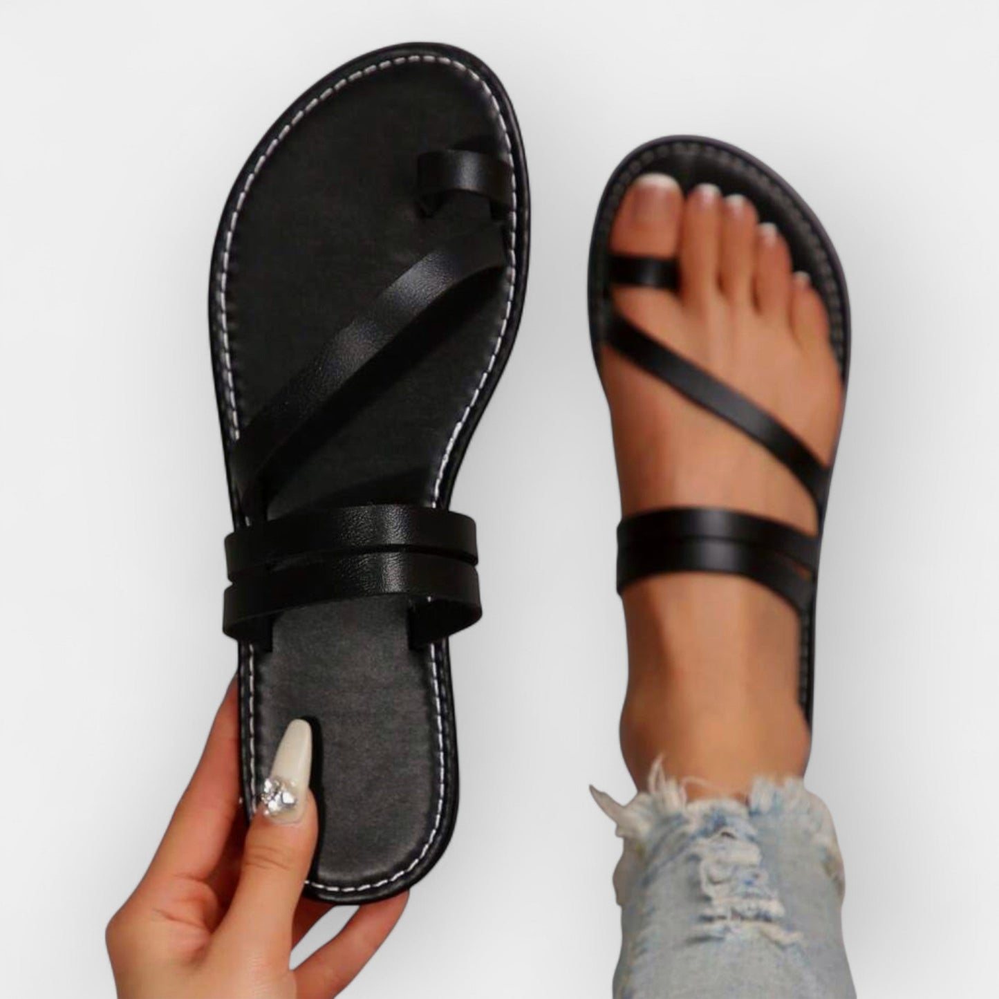 Sandalias planas de tira trenzada