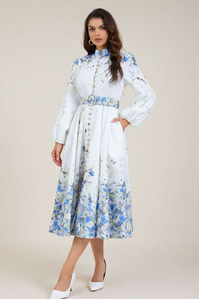 Amelie - Top floral azul de cuello alto