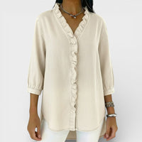 Elena - Blusa elegante con volantes