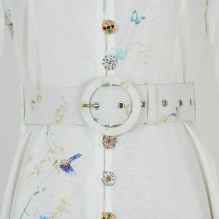 Amelie - Top floral azul de cuello alto