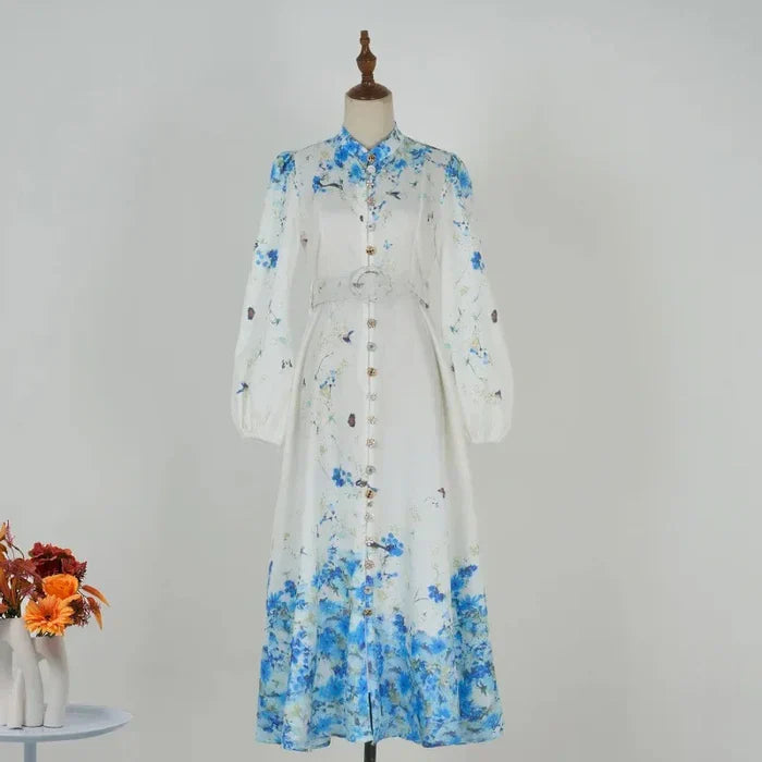 Amelie - Top floral azul de cuello alto