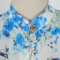 Amelie - Top floral azul de cuello alto