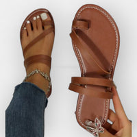 Sandalias planas de tira trenzada