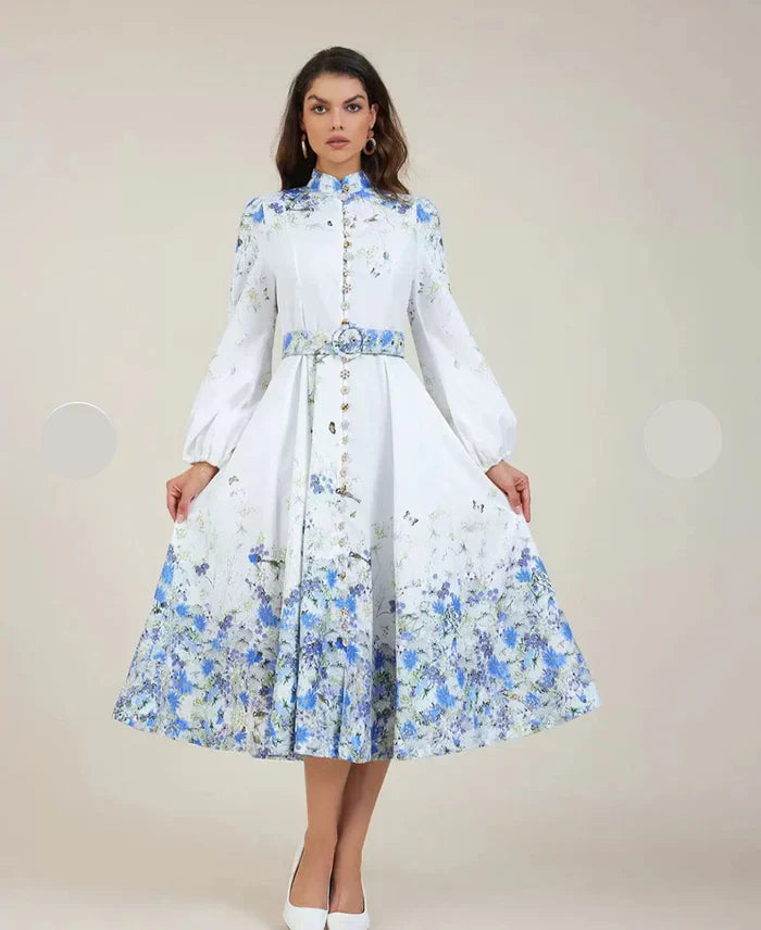 Amelie - Top floral azul de cuello alto